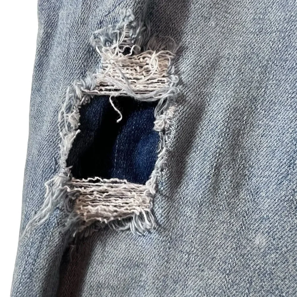 Chico's so slimming distressed ankle fit jeans.